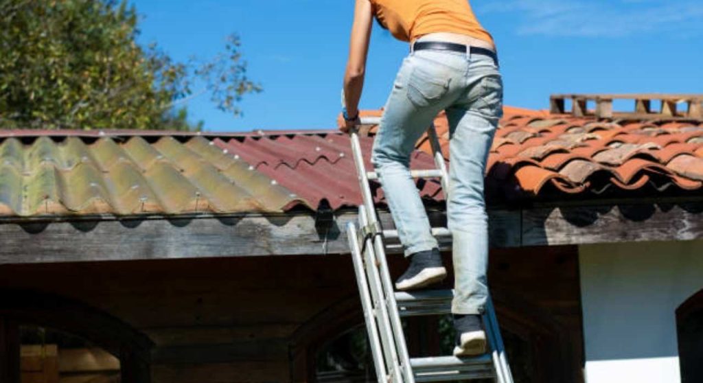 Roof leak repair cost overview showing damaged roof and professional fixing water leak on residential home