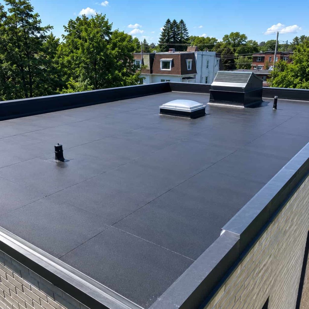 Finished flat roofing system with smooth waterproof membrane surface and clean commercial flat roof installation.