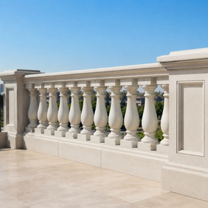 Finished stone parapet wall with elegant baluster design on a clean rooftop terrace, realistic architectural masonry work, bright natural daylight, premium exterior railing installation, modern residential parapet construction with clear sky background.